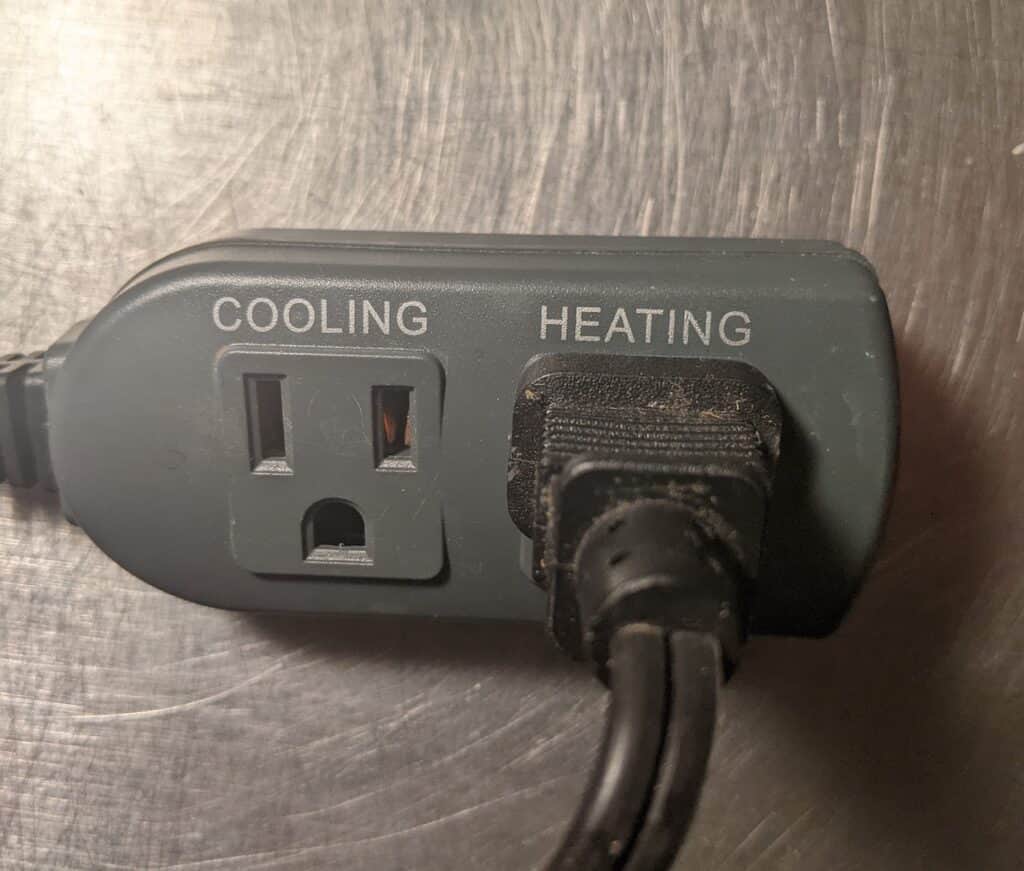 heating mat plugged into temperature controller
